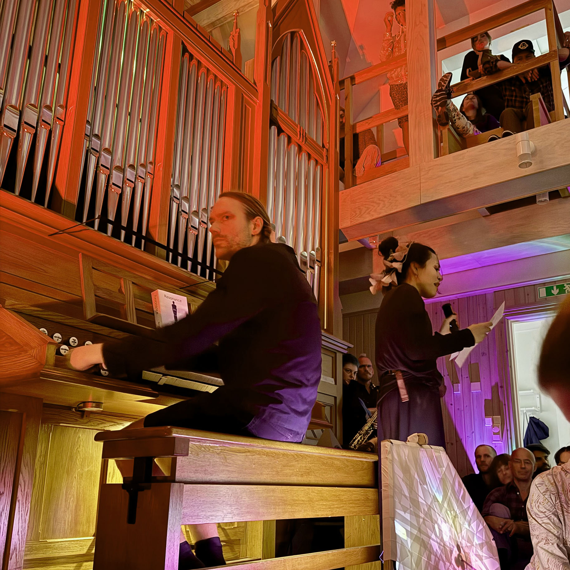 A person playing the organ inside the Organ Villa.